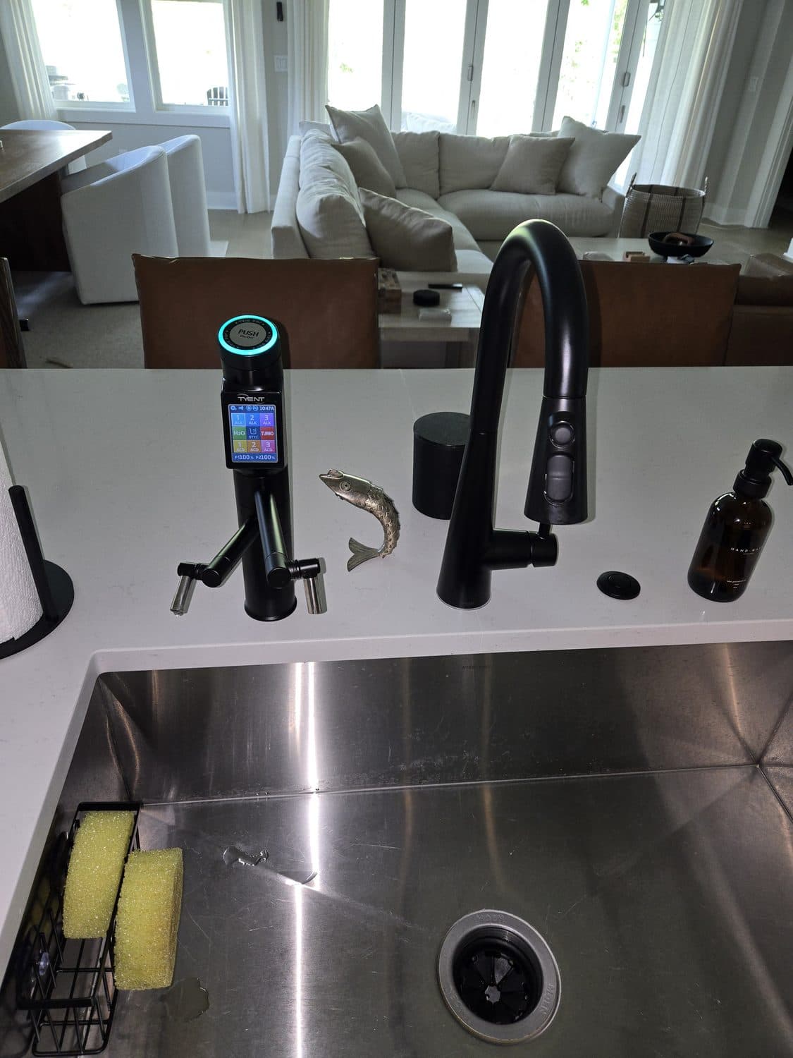 D'Pure Tyent ionizer and filtered tap at a modern kitchen island